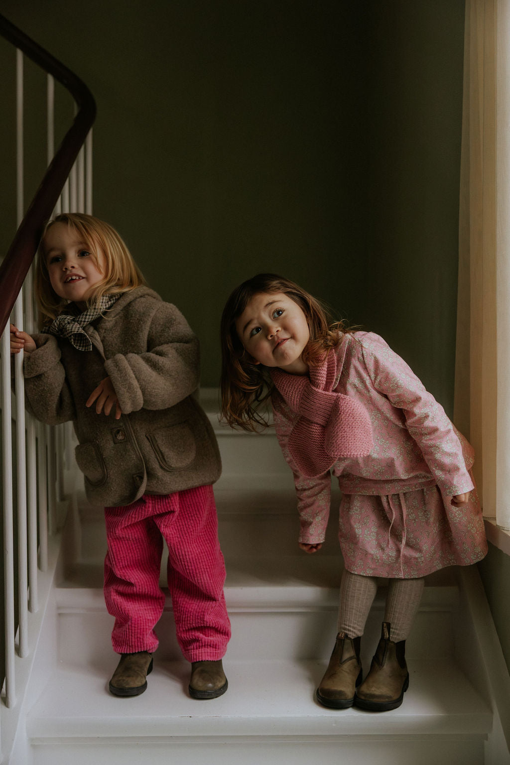 Girl wearing Lalaby Rita scarf in sorbet pink cashmere