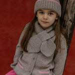 Girl wearing Lalaby Rita scarf in toast brown cashmere