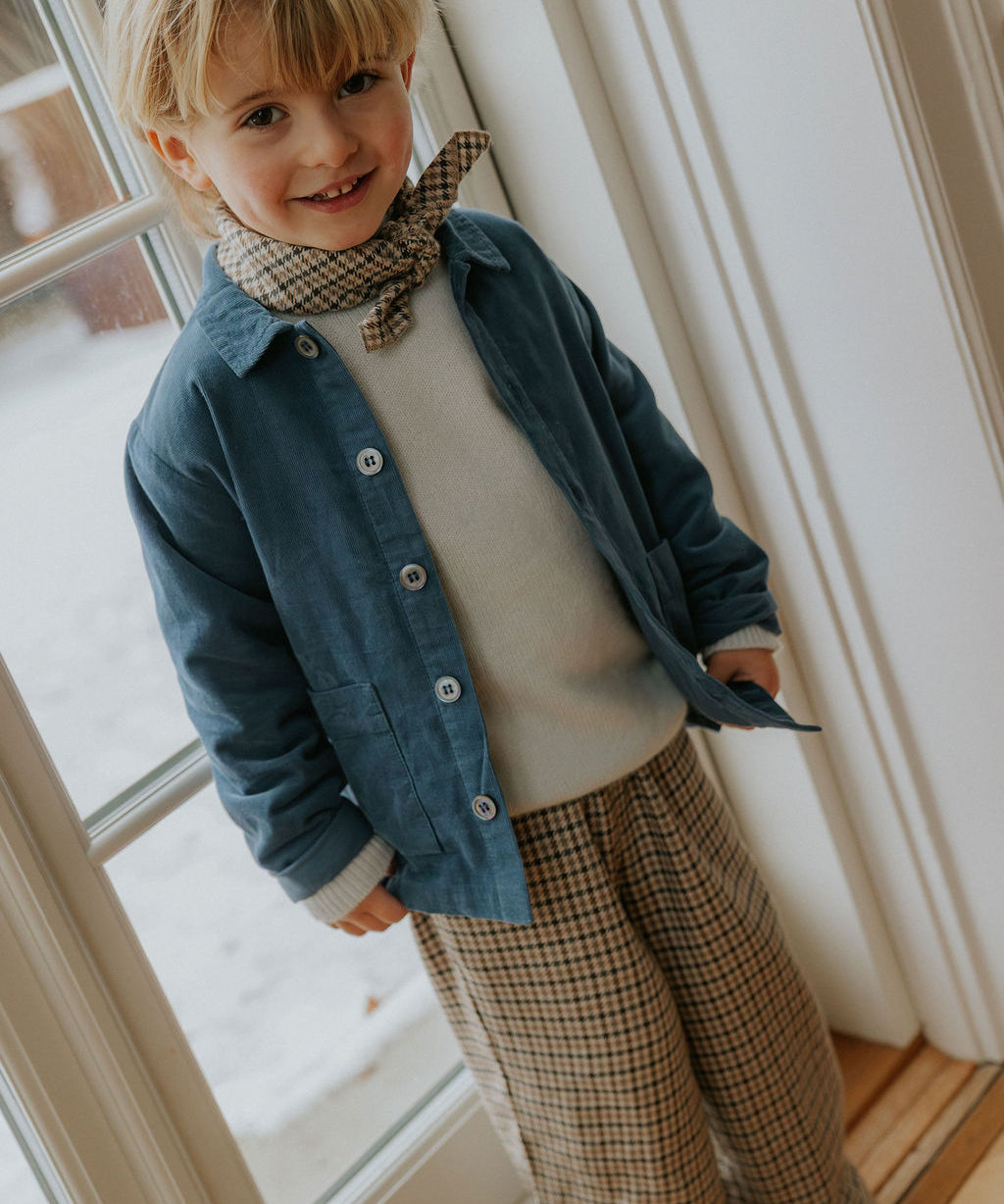 Boy wearing Lalaby Sam kids overshirt in whale blue cotton baby cord