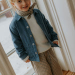 Boy wearing Lalaby Sam kids overshirt in whale blue cotton baby cord