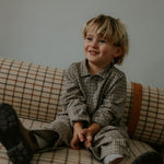 Boy wearing Lalaby Saxo kids shirt in tweedy check organic cotton