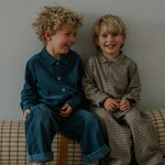 Boy wearing Lalaby Saxo kids shirt in tweedy check organic cotton
