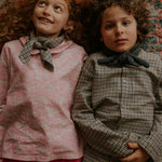Boy wearing Lalaby Saxo kids shirt in tweedy check organic cotton