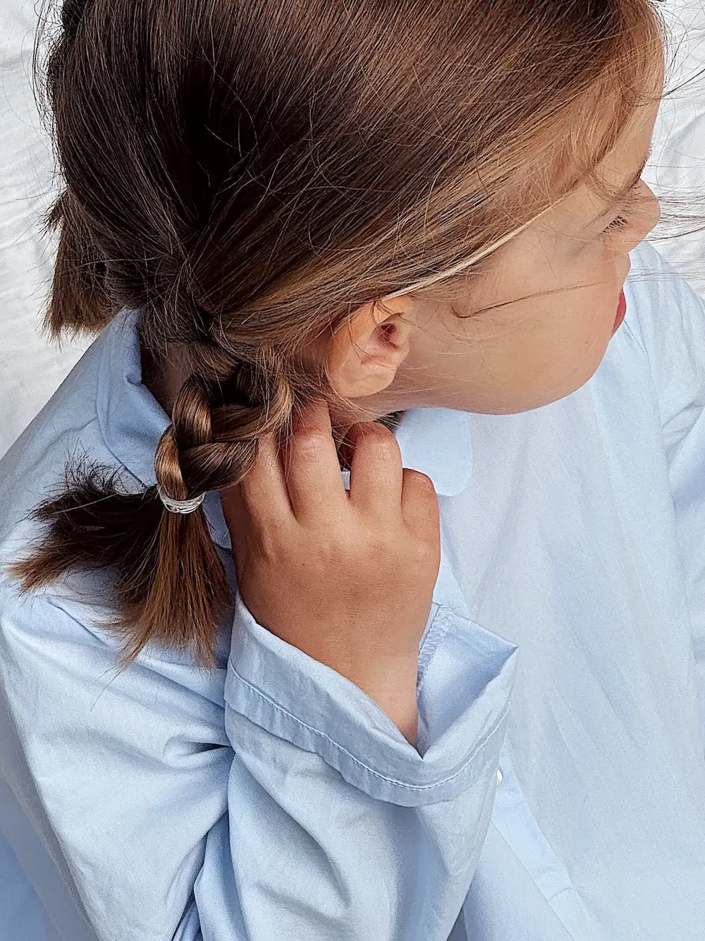 Girl wearing Lalaby summer pj dress for kids in sky blue organic cotton