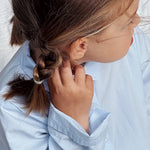Girl wearing Lalaby summer pj dress for kids in sky blue organic cotton