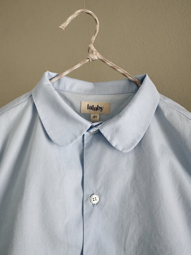 Close up of summer pj collar, from Lalaby, made from sky blue organic cotton