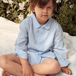 Boy wearing Lalaby summer pyjamas for kids in sky blue organic cotton