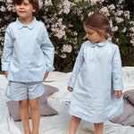 Boy and girl wearing Lalaby summer pyjamas and summer pj dress for kids in sky blue organic cotton