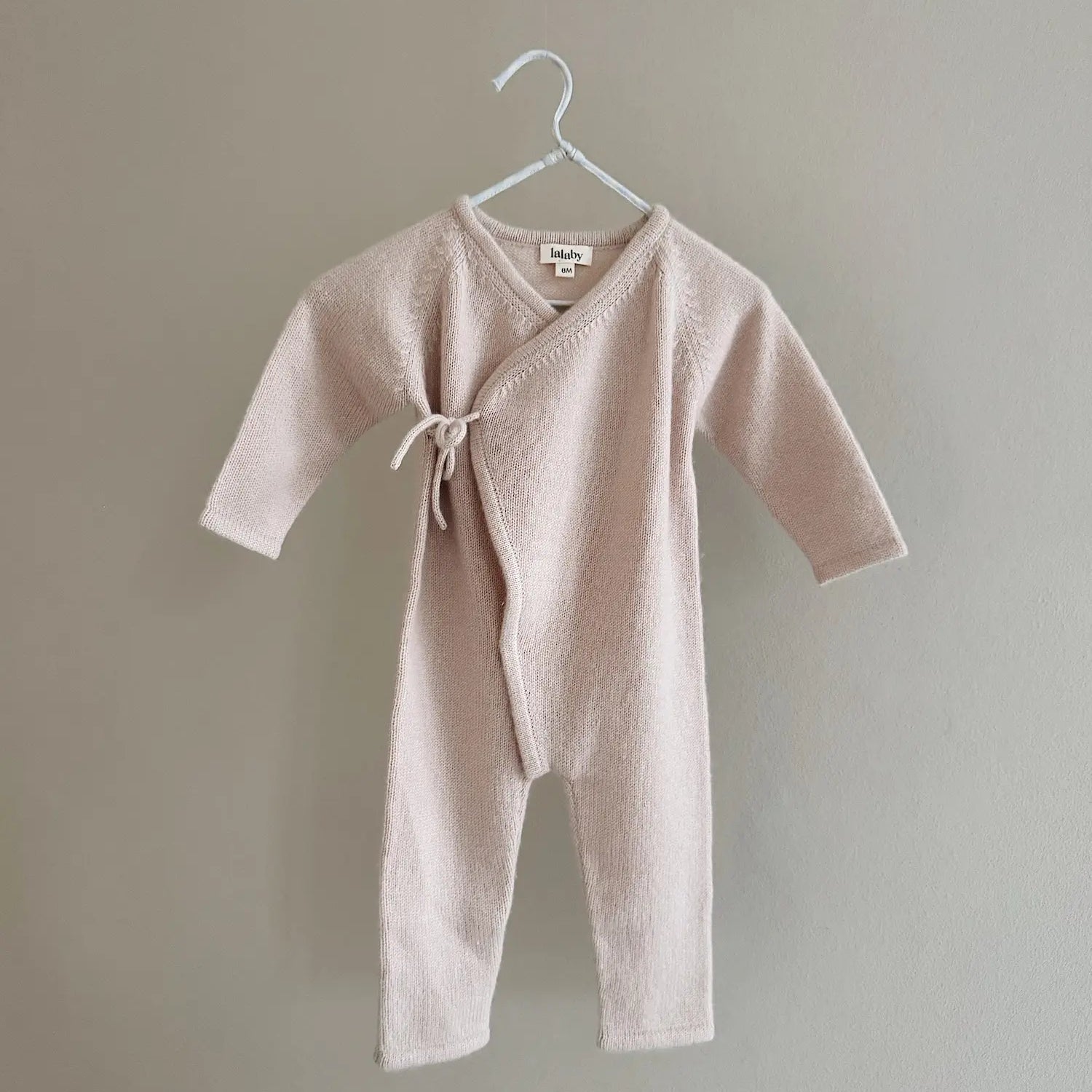 Lalaby Uma jumpsuit for babies in powder pink cashmere