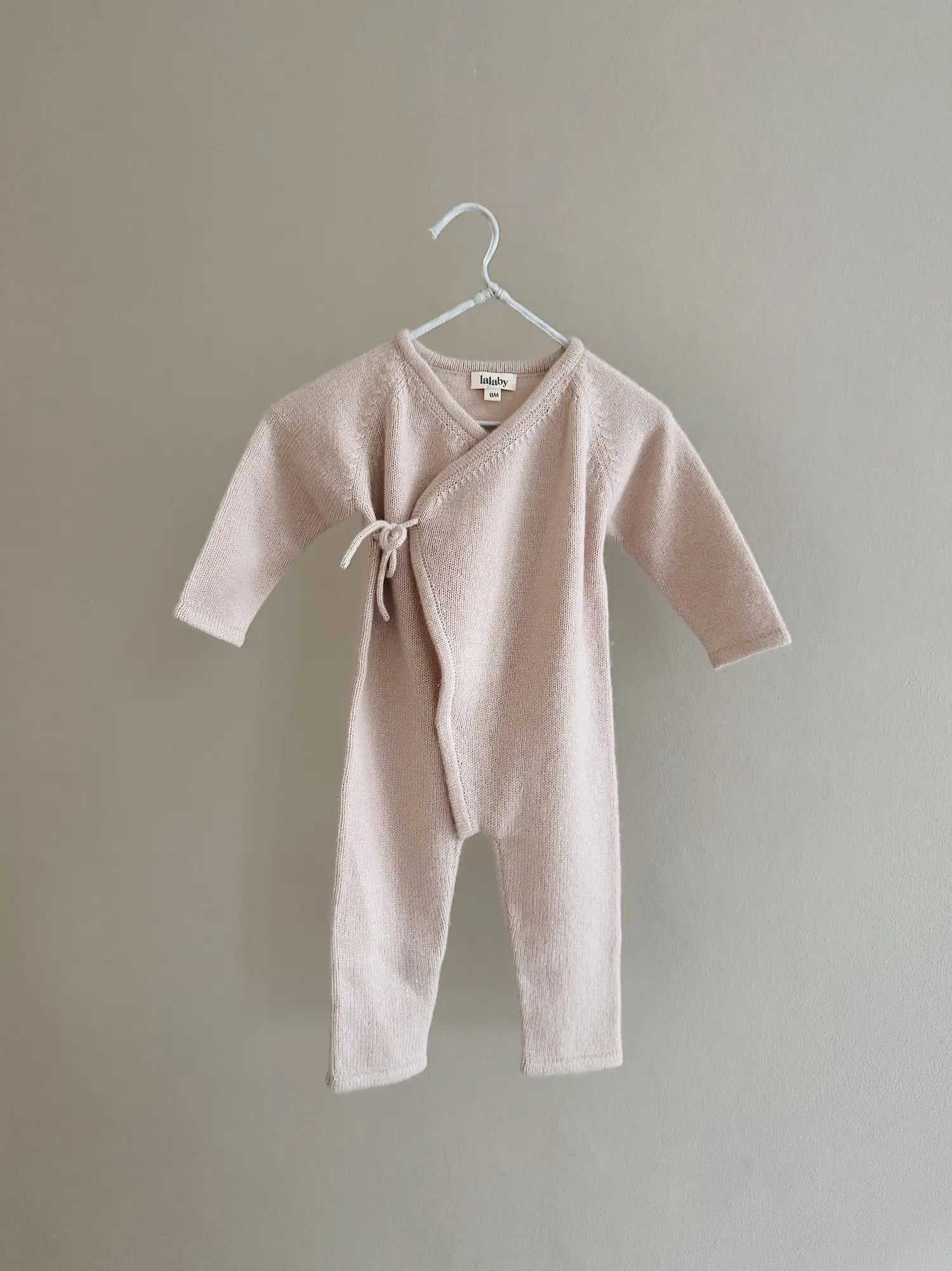 Lalaby Uma jumpsuit for babies in powder pink cashmere