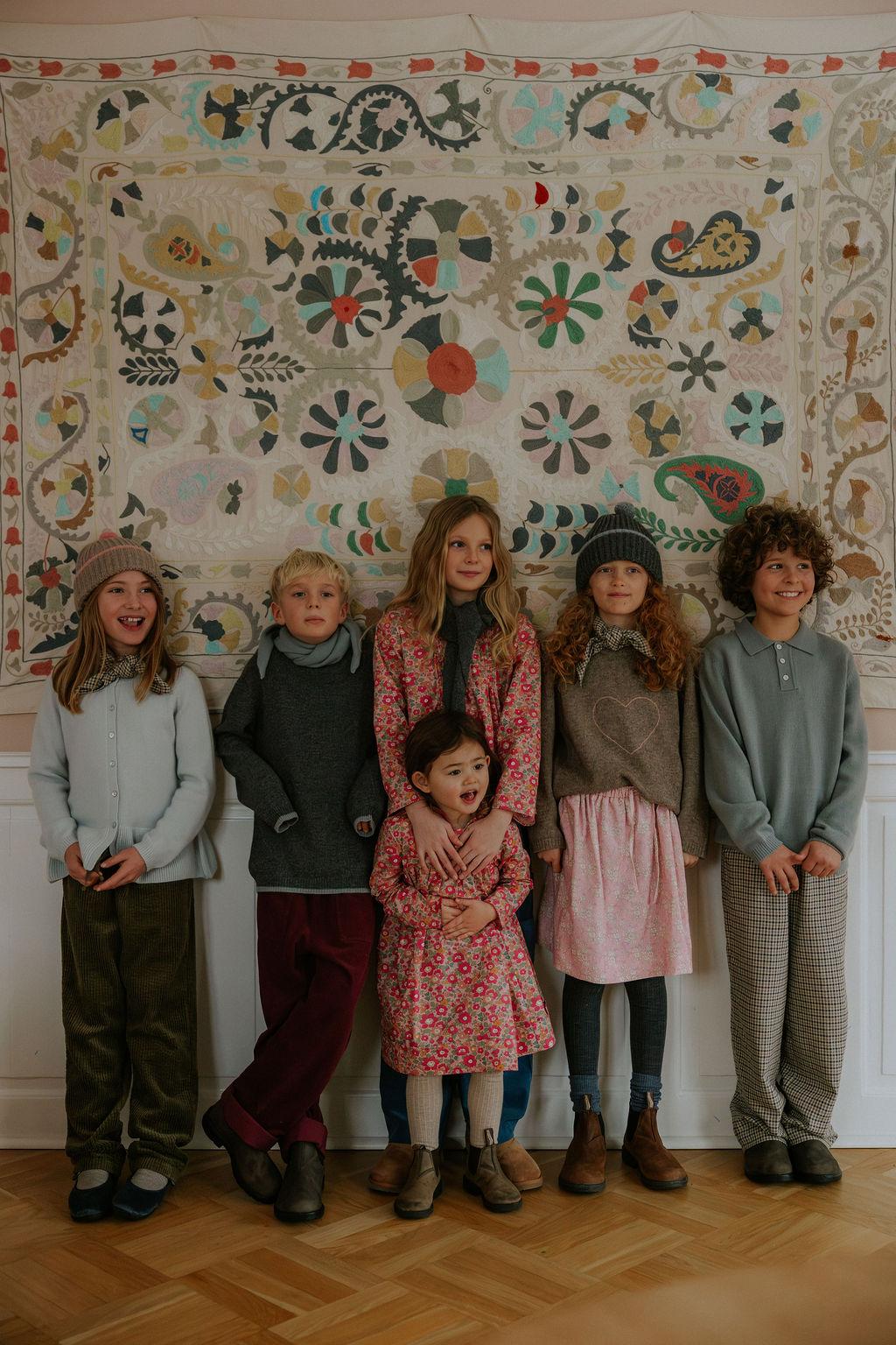 Girl wearing Lalaby Winston hat in toast brown cashmere