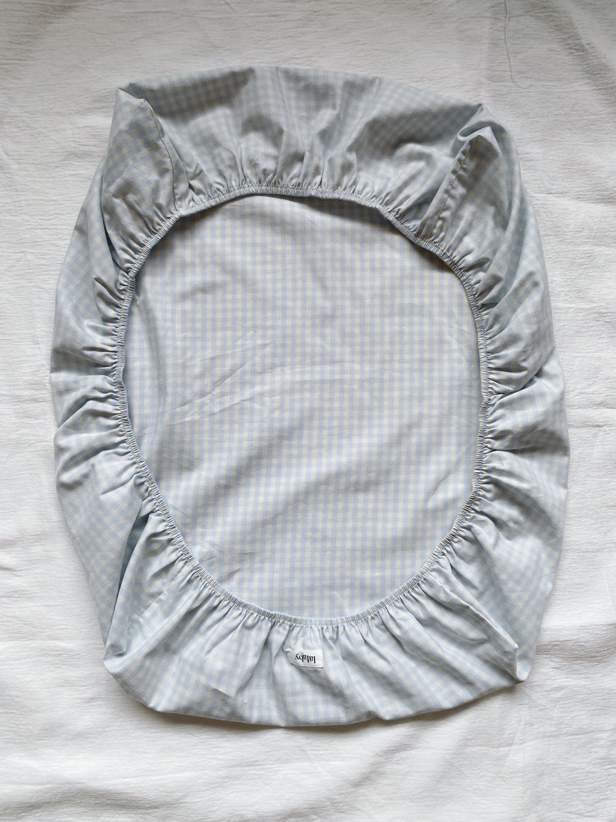 Pusleunderlag blå gingham